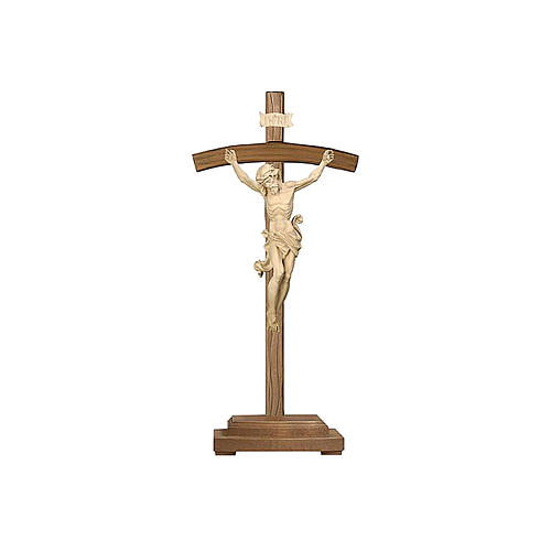 Leonardo crucifix in natural wood with curved cross and support base 1