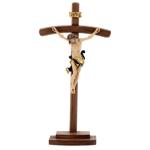 Crucifijo coloreado Leonardo cruz curva con base 1