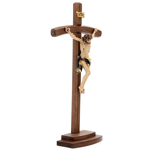 Crucifijo coloreado Leonardo cruz curva con base 4