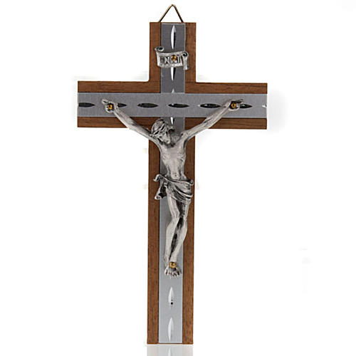 Crucifix métal argenté, bois, alluminium. 1