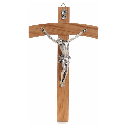 Curved crucifix in oak wood and body in metal 1