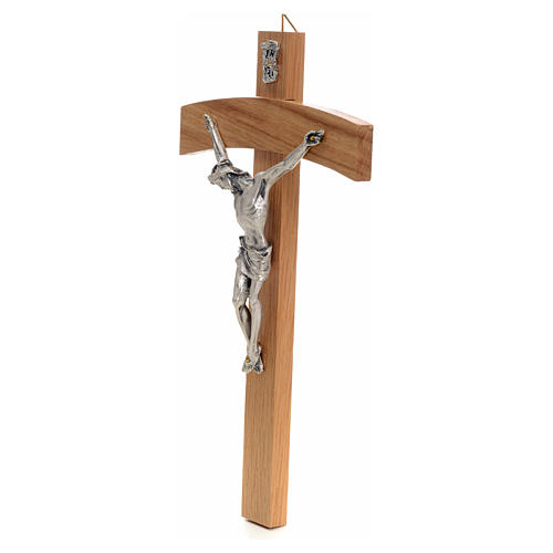 Curved crucifix in oak wood and body in metal 2