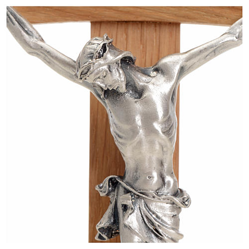 Curved crucifix in oak wood and body in metal 3