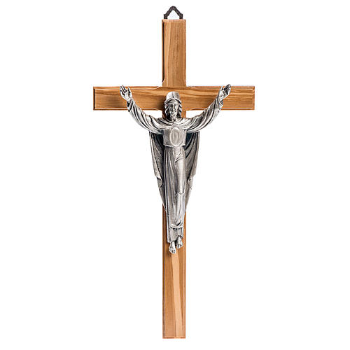 Cruz estilizada de caoba, cuerpo de Jesús plateado 1