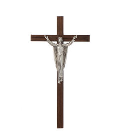 Resurrected Christ crucifix on thin walnut wood.