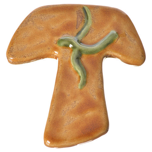 Kreuz Tau aus brauner Keramik mit grüner Taube. 1