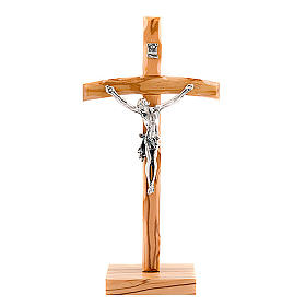 Krucyfiks stojący z drewna oliwkowego o zakrzywionym ksztaÅ