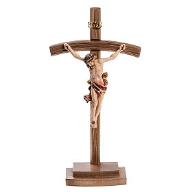 Crucifix in wood with base and curbed cross