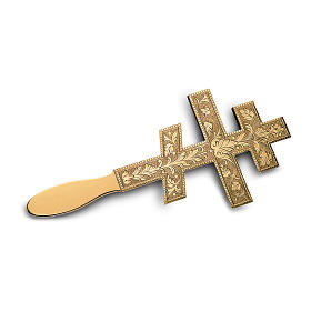 Byzantine cross carved by hand in golden brass