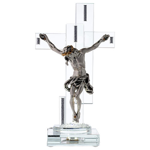 Crucifix in crystal with metal body of Christ and light 1