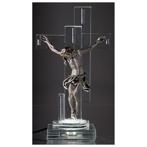 Crucifix in crystal with metal body of Christ and light 2
