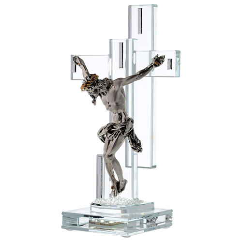 Crucifix in crystal with metal body of Christ and light 3