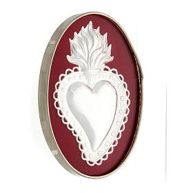 Ex-voto metal heart with flames and frame