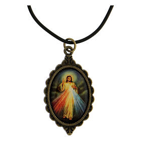 Merciful Jesus medal on a string