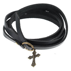 Black strap bracelet with brass-plated cross