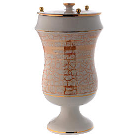 Cremation urn in ceramic, white and gold colour