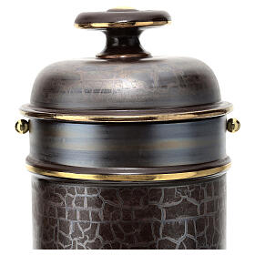 Cremation urn in white ceramic
