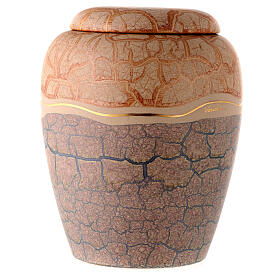 Cremation urn with marbled cream majolica casing