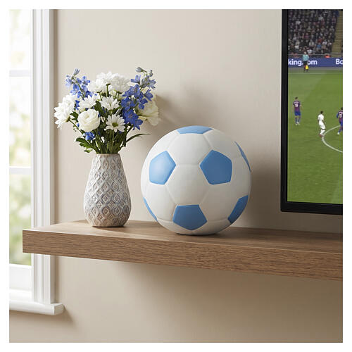 White and light‑blue soccer ball cremation urn in artistic ceramic 2