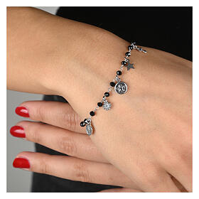 Agios bracelet with dangle charms and black beads, rhodium-plated 925 silver