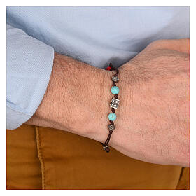 Pulsera Agios con piedras azules de tejido sostenible