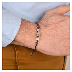 Pulsera Agios con piedras blancas de tejido sostenible