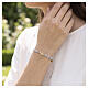 Bracciale Benedictus in filo bianco con croce dorata e zirconi s2