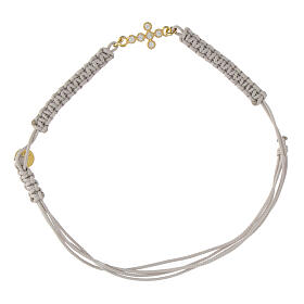 Pulseira Benedictus tecido branco com cruz dourada e zircões