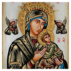 Our Lady of perpetual help icon with polychrome decorations