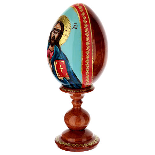 Hand-painted wooden egg with Christ Pantocrator on light blue background, 8 in 3