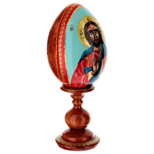 Hand-painted wooden egg with Christ Pantocrator on light blue background, 8 in 4
