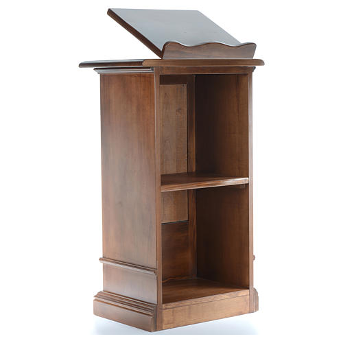 Single-column book stand with round base in light brown wood