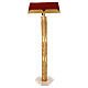 Single-column book stand with marble base in gold brass with stylized design s1