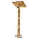 Single-column book stand with marble base in gold brass with stylized design s7