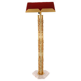 Single-column book stand with marble base in gold brass with stylized design