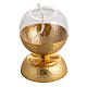 Lamp for liquid wax in hammered golden brass s1
