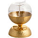 Lamp for liquid wax in hammered golden brass s3