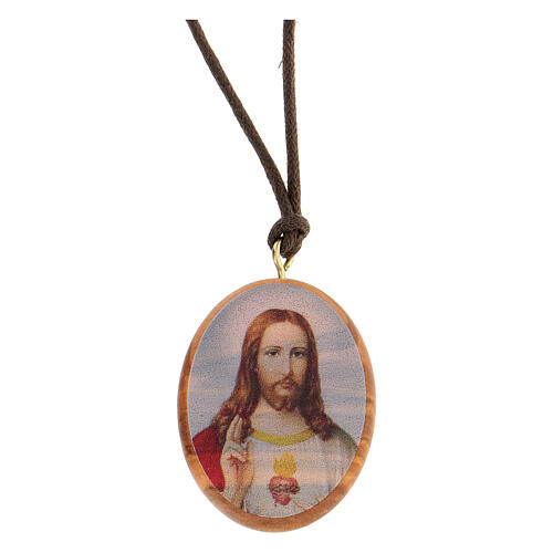 Ovale Medaille aus Olivenbaumholz mit dem Heiligsten Herzen Jesu 1