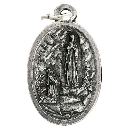 Our Lady of Lourdes oval medal in oxidised metal 20mm 1