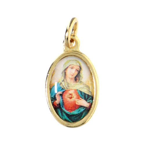 Sacred Heart of Mary medal in golden metal and resin 1.5x1cm 1