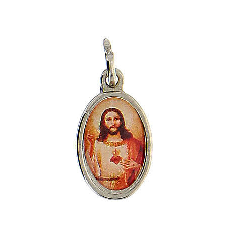 Medalha rosto Sagrado Coração Jesus metal prateado resina 1,5x1 cm 1