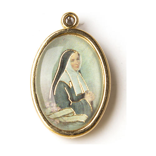 Saint Bernardette golden medal with image in resin 1