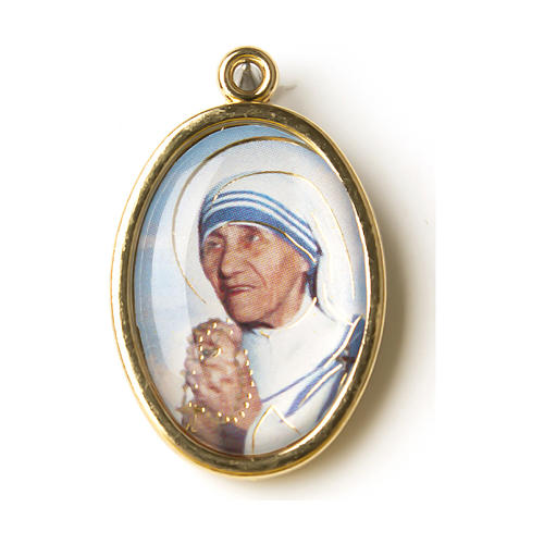 Saint Teresa of Calcutta medal in golden metal with resin image 1