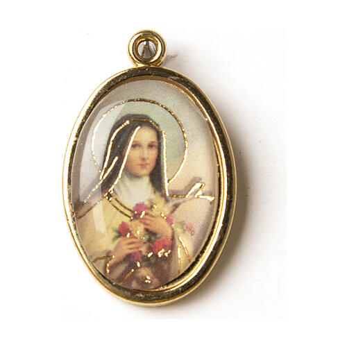 Medalha dourada com imagem Santa Teresa resina 1