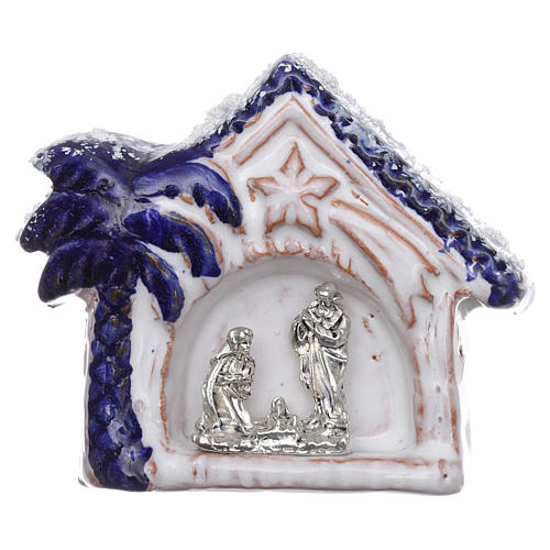 Magnet snowy hut with blue palm tree and Nativity Scene in Deruta terracotta 1