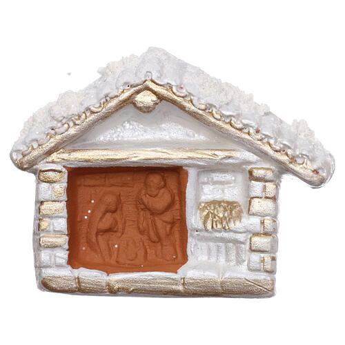Magnet aus Terrakotta von Deruta in Form einer weißen Hűtte mit goldfarbigen Verzierungen und Christi Geburt 1
