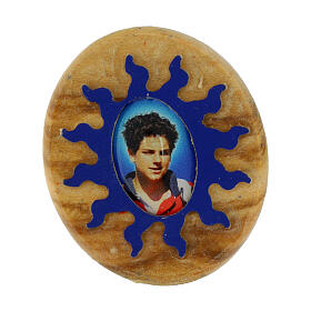 Oval magnet with blue sun's rays and Carlo Acutis' image, olivewood