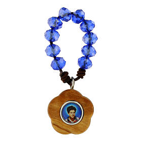 Single decade rosary bracelet of 2.5 in, blue beads and olivewood flower with Carlo Acutis' image