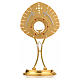 Monstrance with crosses and red stones in gold-plated brass s1
