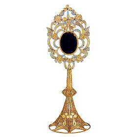 Reliquary in silver 800, oval shaped and filigree decorated